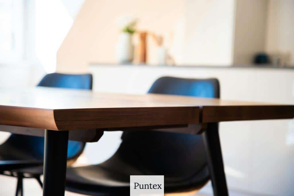selective focus photography of table and chairs