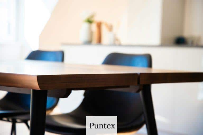 selective focus photography of table and chairs
